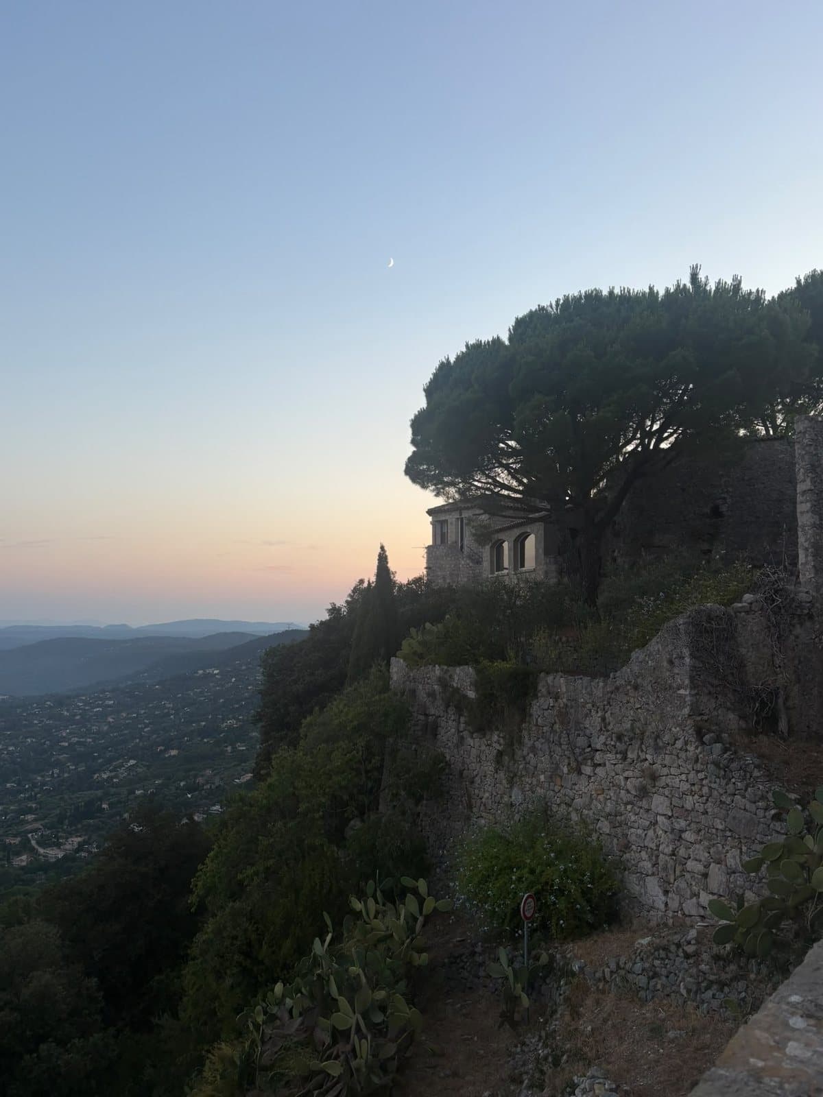 Dinner on a village terrace in Cabris as evening falls, and a lane of the old village at dusk