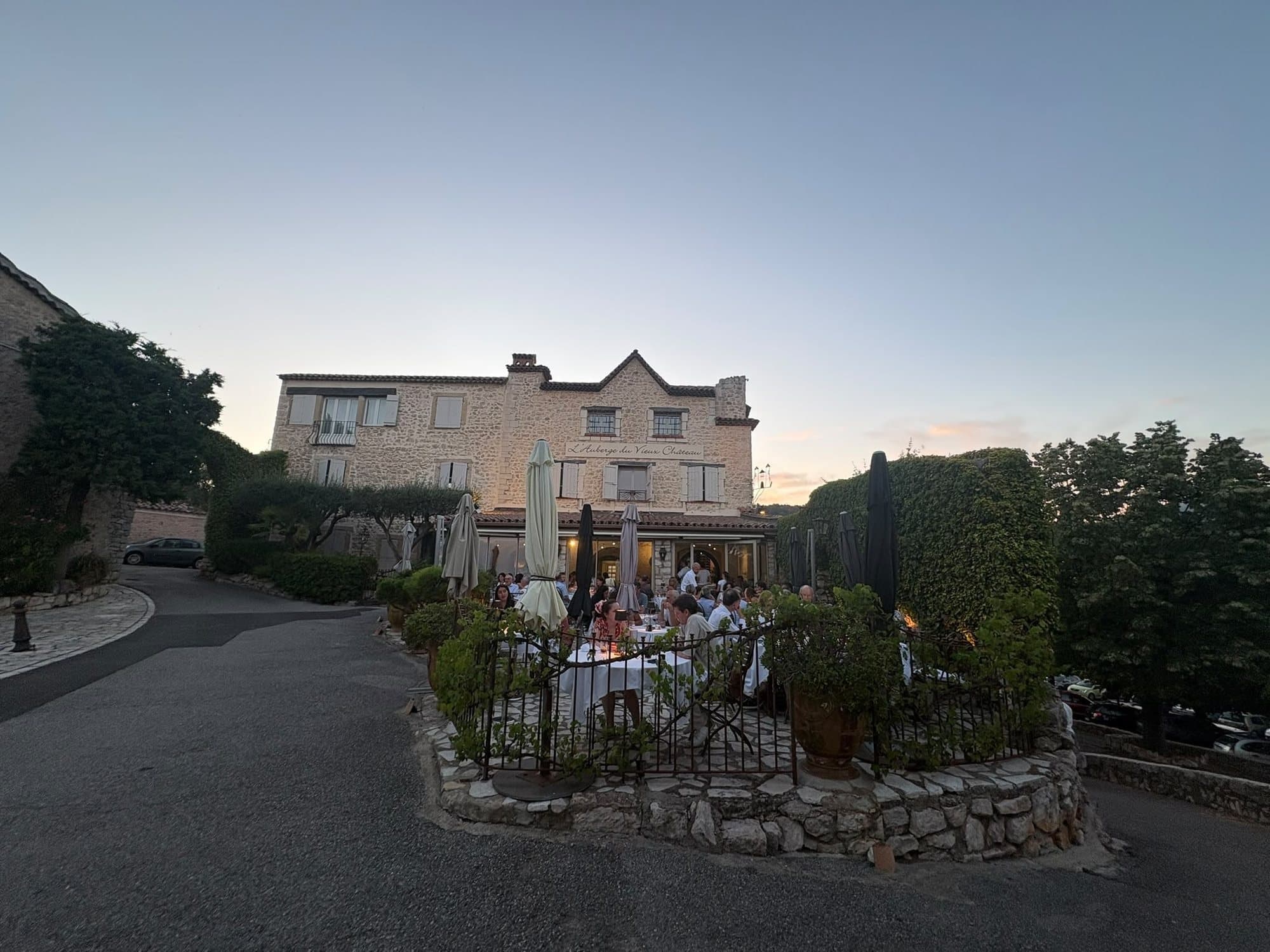 Dinner on a village terrace in Cabris as evening falls, and a lane of the old village at dusk