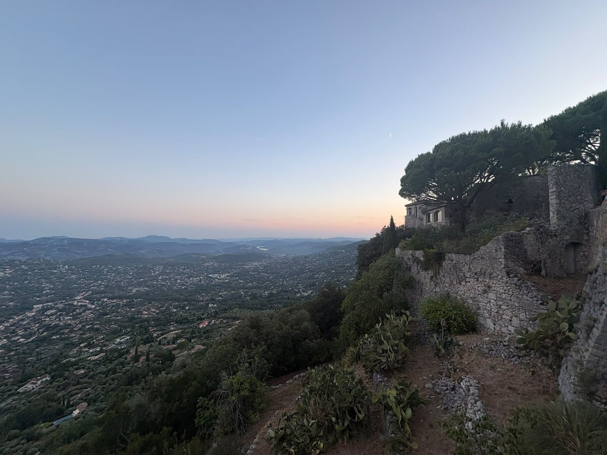 Dusk panorama from the castle ruins of Cabris, with an umbrella pine and the moon