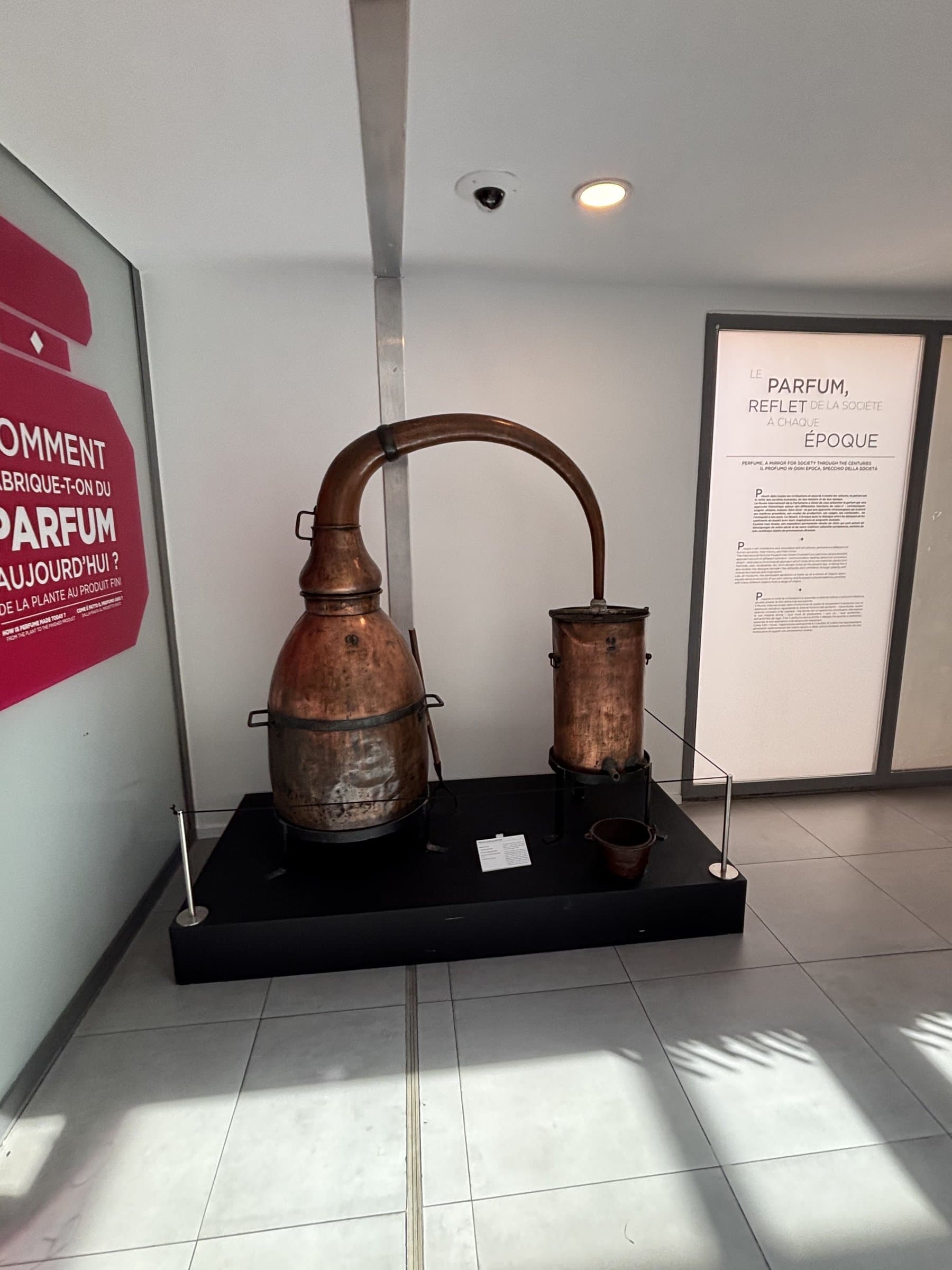 Large double-bodied copper still on display at the International Perfume Museum