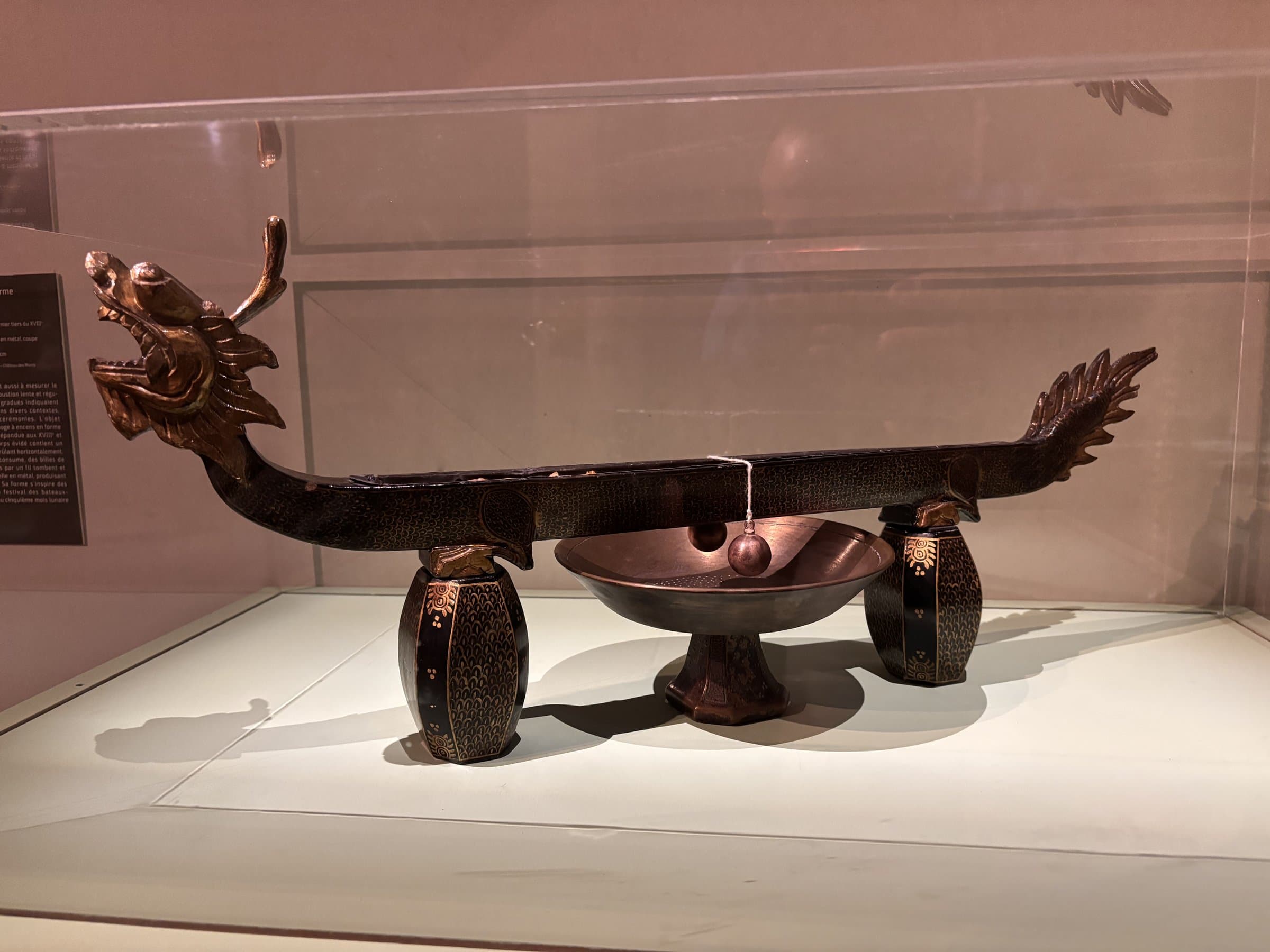 Lacquered and gilded dragon-boat incense clock, Qing dynasty, Asian Perfumes exhibition at the International Perfume Museum, Grasse